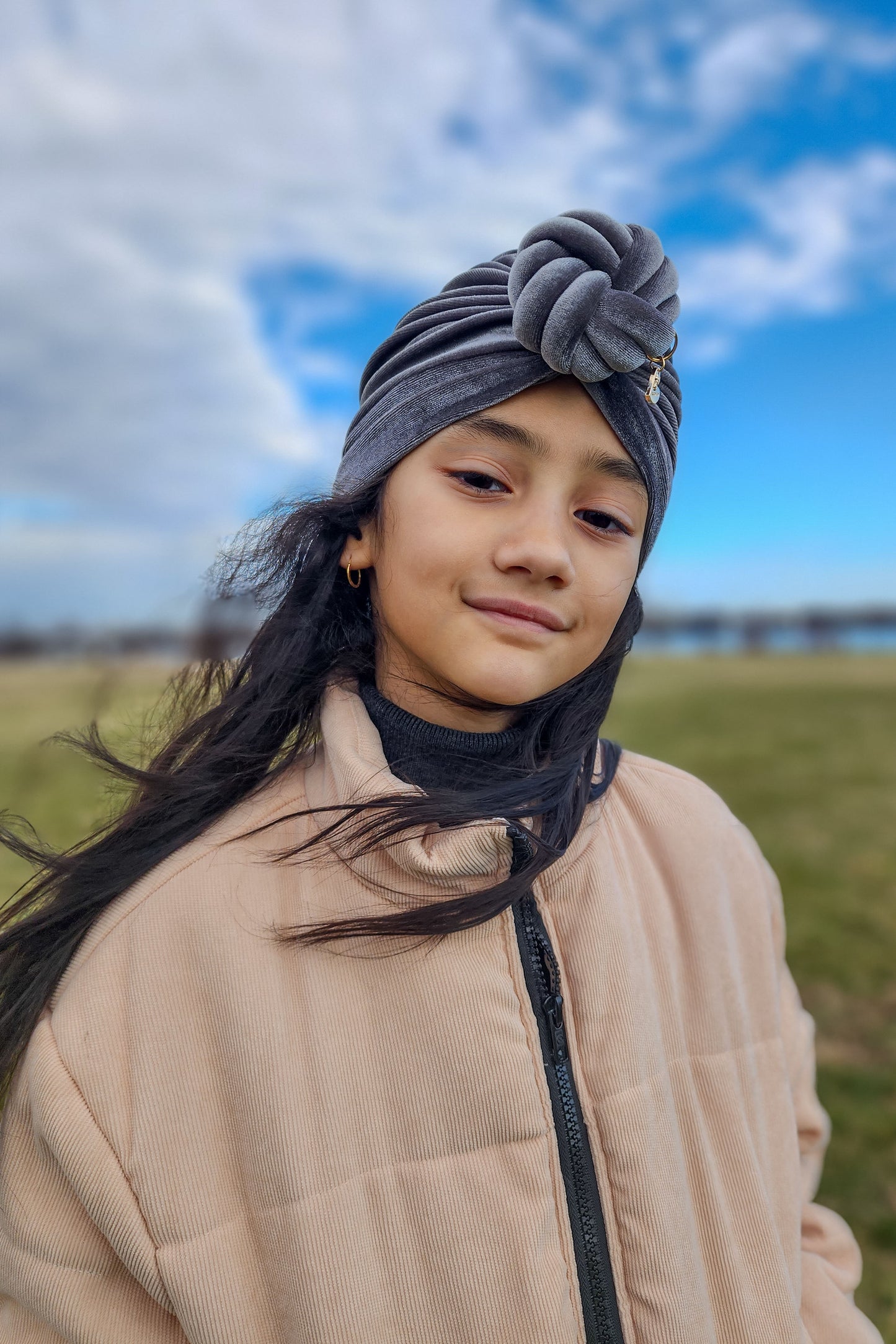 Kids velvet turban knot in grey color close-up view