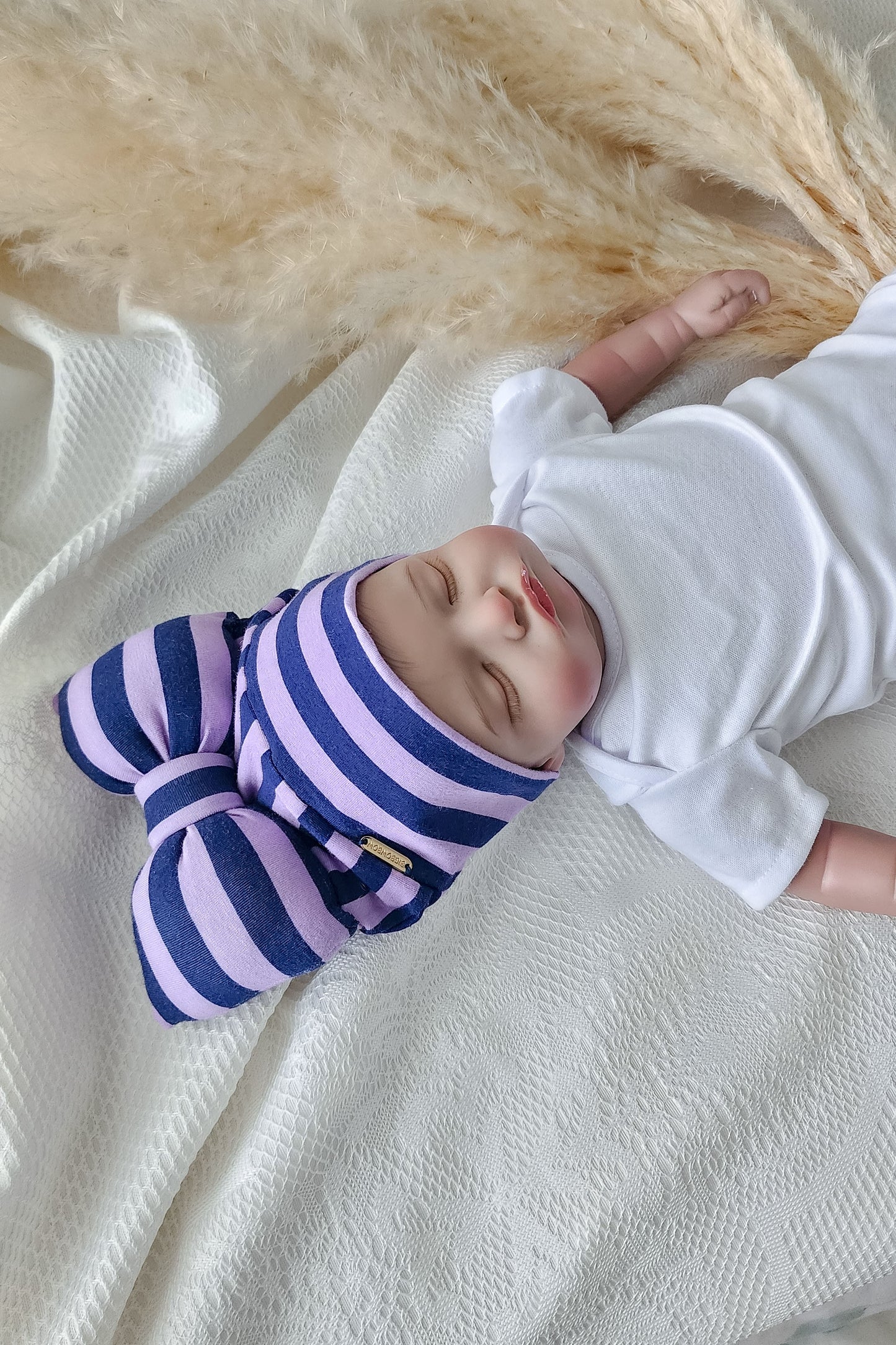 beanie bow stripe lilac and navy detail view