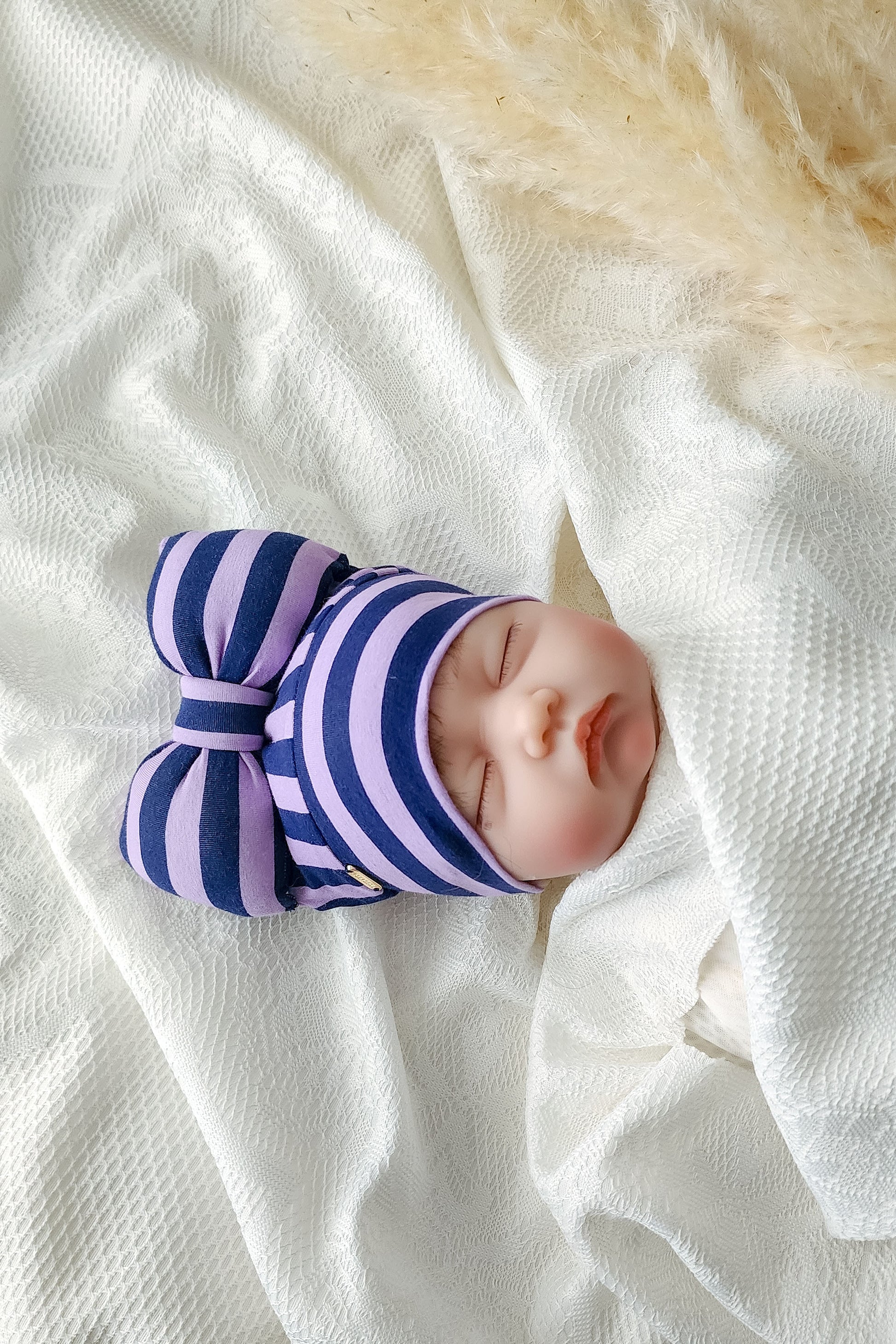 beanie bow stripe lilac and navy side view