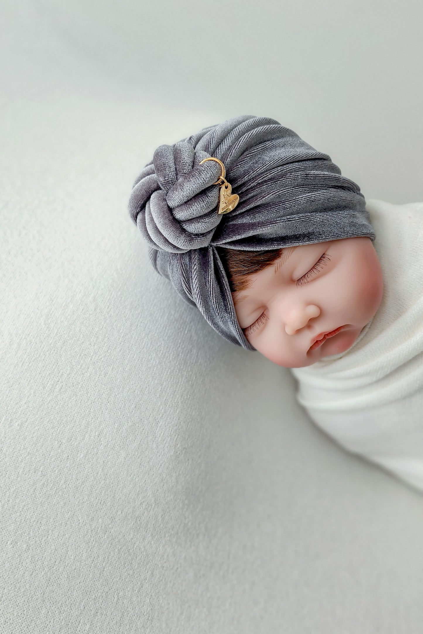 Baby girl velvet turban knot in grey color close-up view