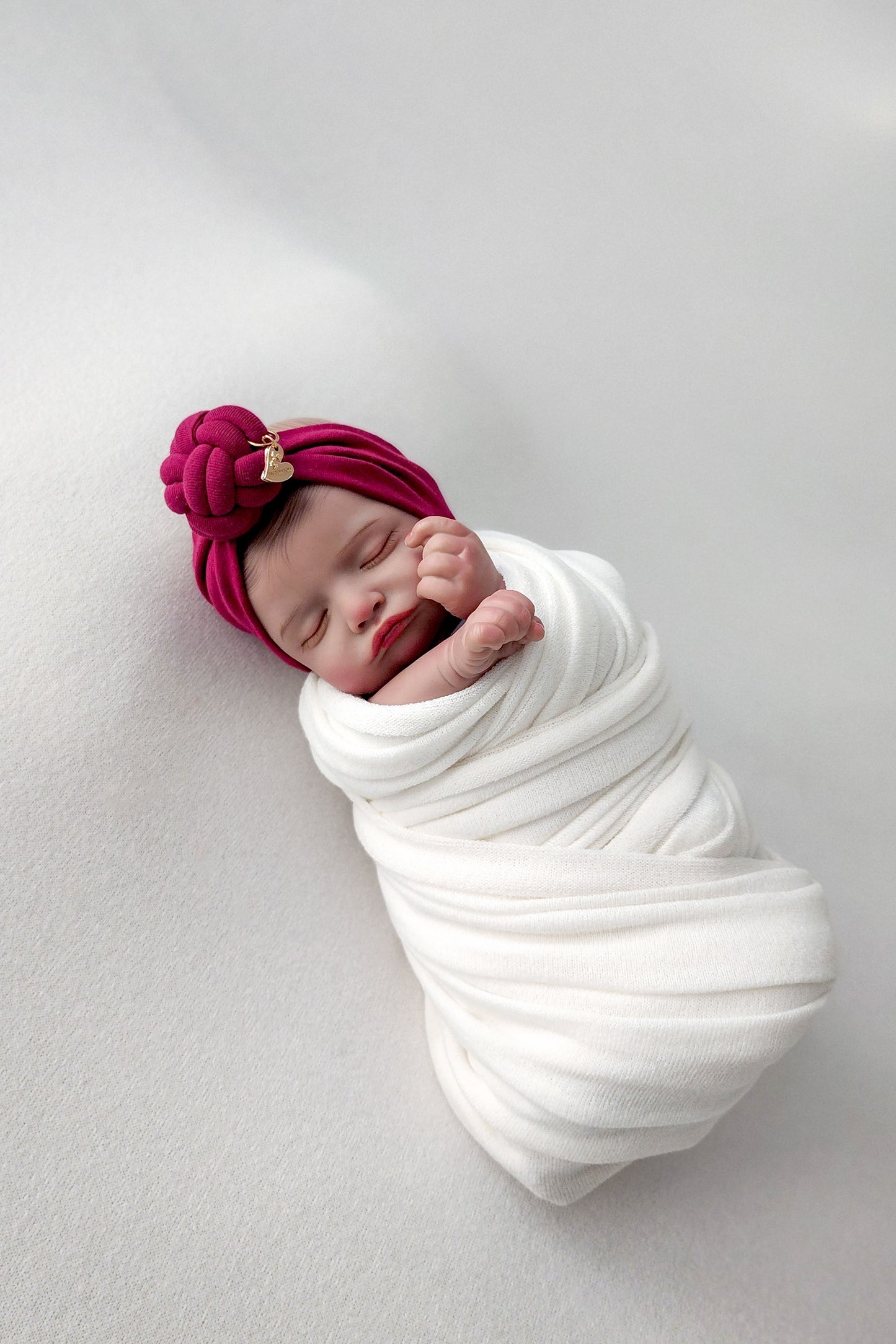 Bigbowbow burgundy color of headband knot side view, preemie size