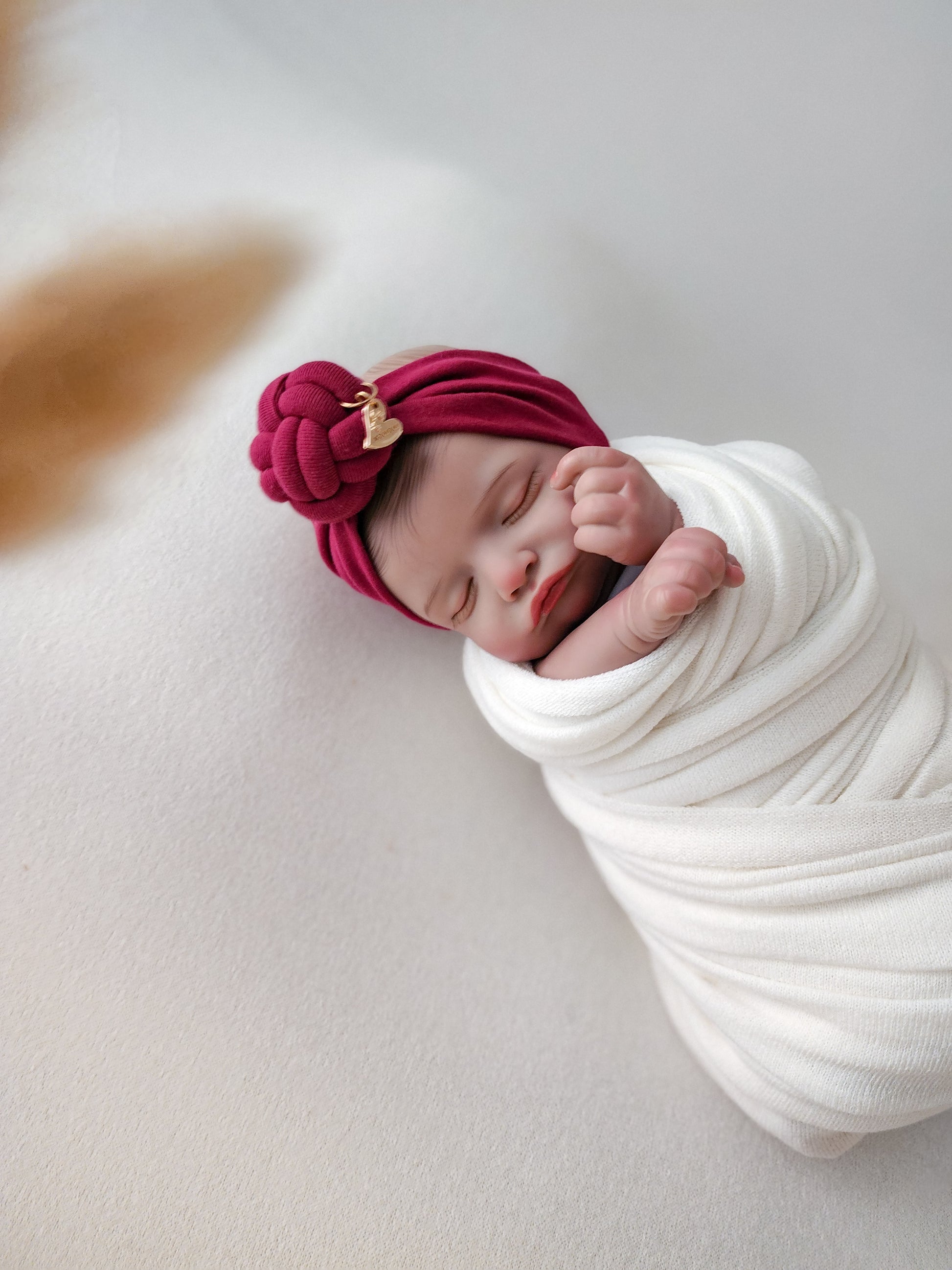 Bigbowbow burgundy color of headband knot side view, preemie size