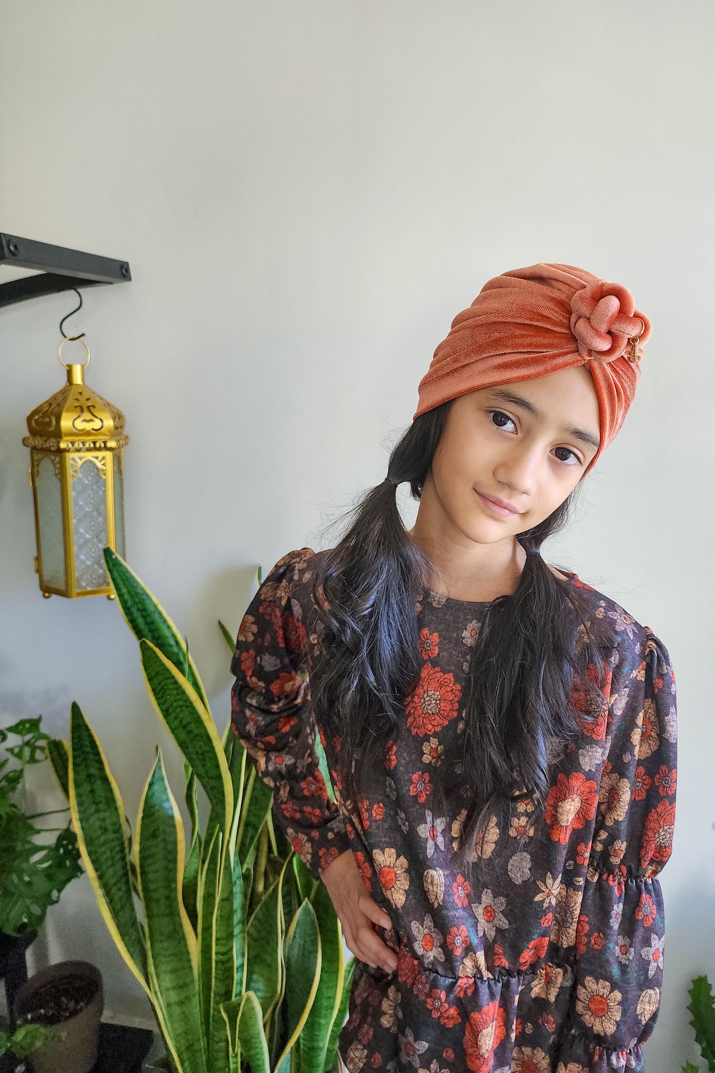 Turban velvet knot in burnt orange closeup view