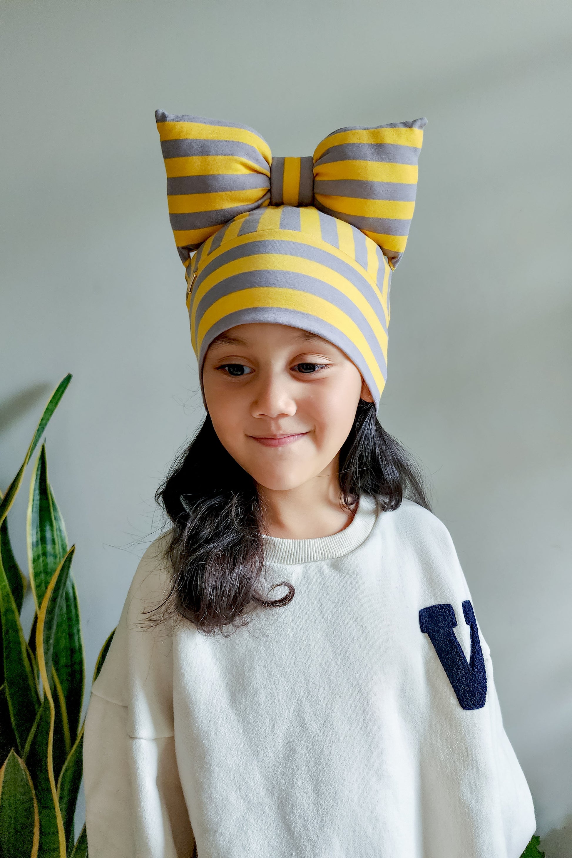 Beanie bow toddler hat stripe get front view in grey and yellow