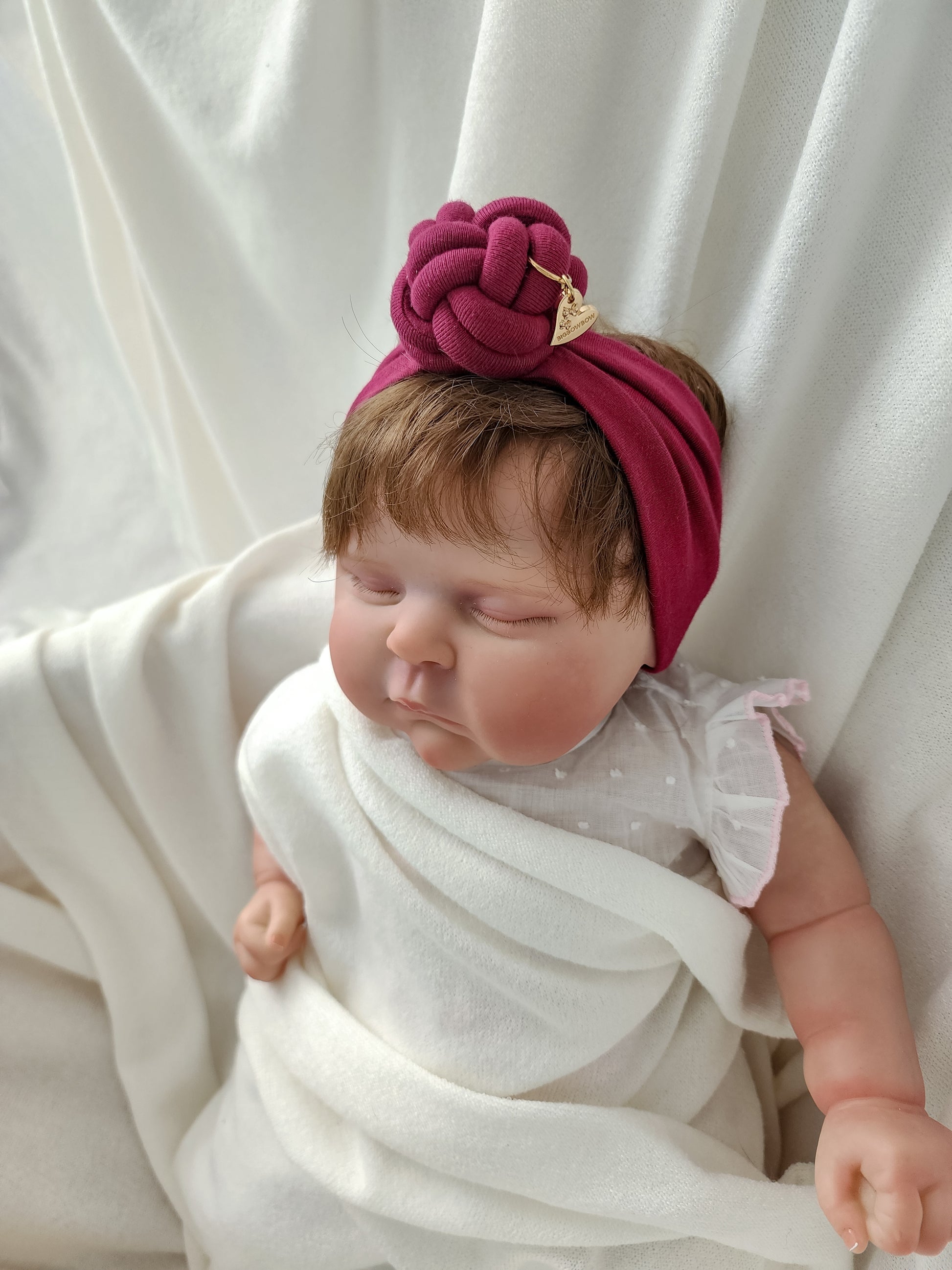 Bigbowbow burgundy color of headband knot in details view