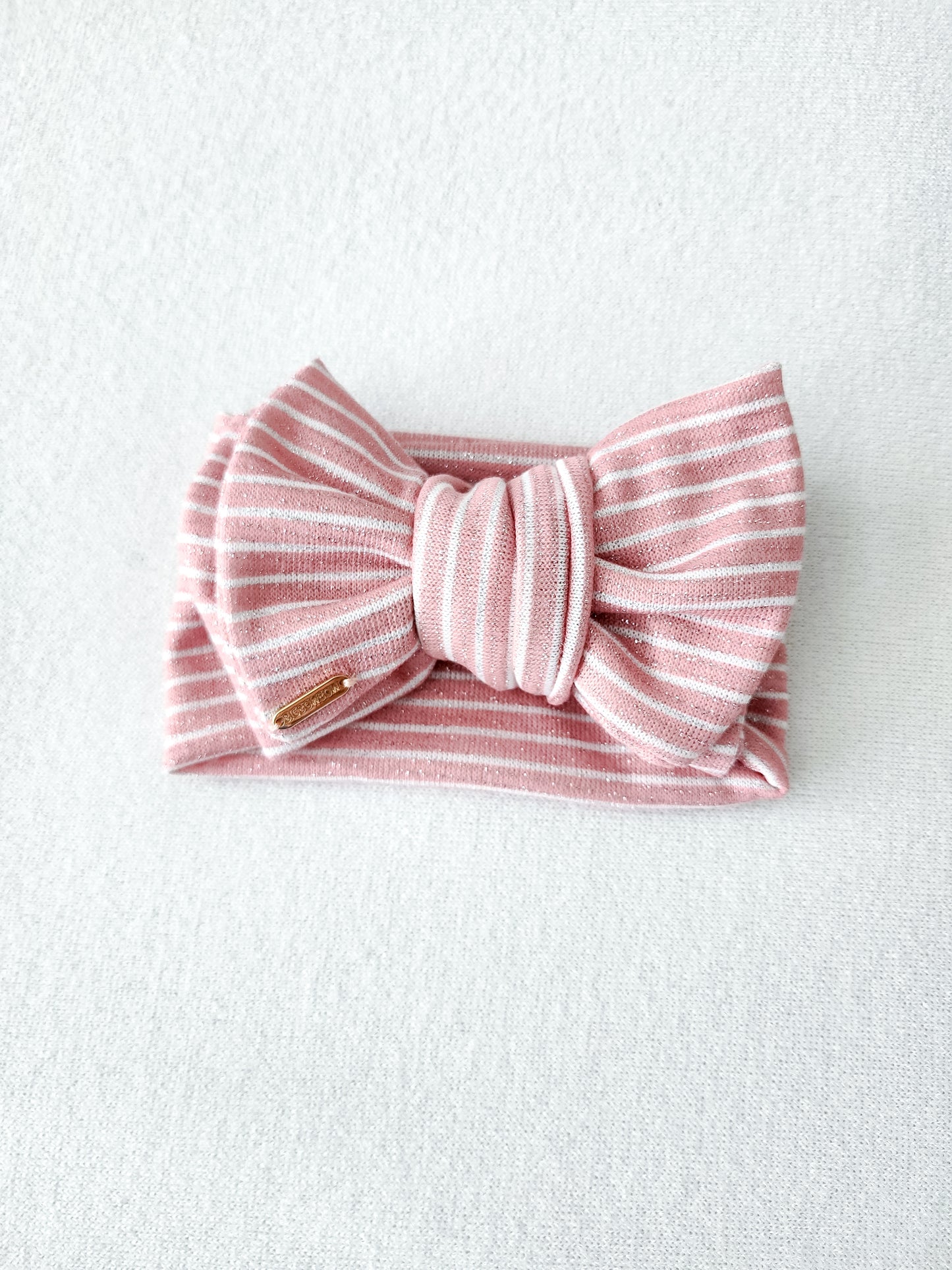 Oversized head wrap bow for baby and adults, glitter pink stripe. front view and details