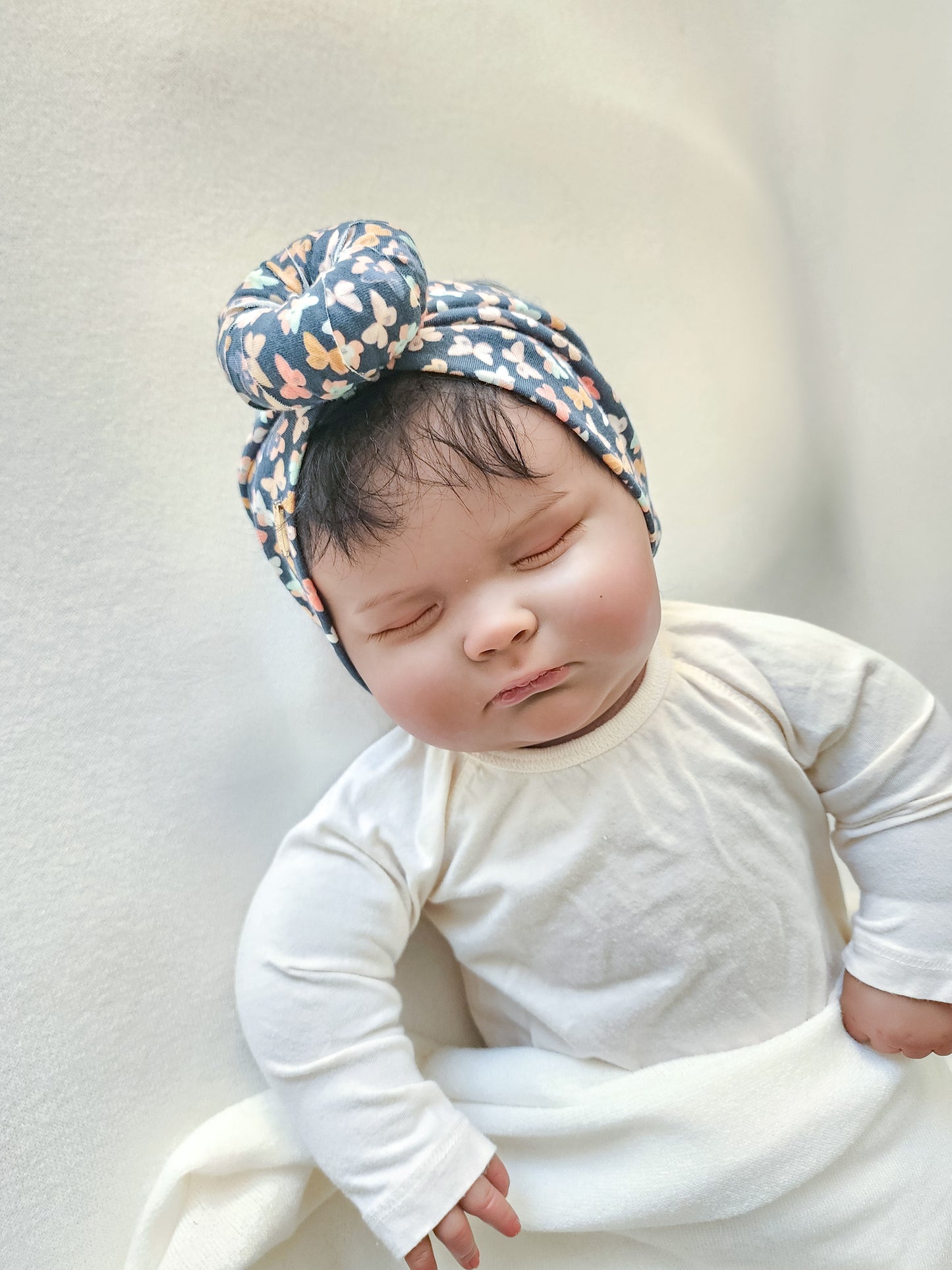 Headband donut in small butterfly print front view