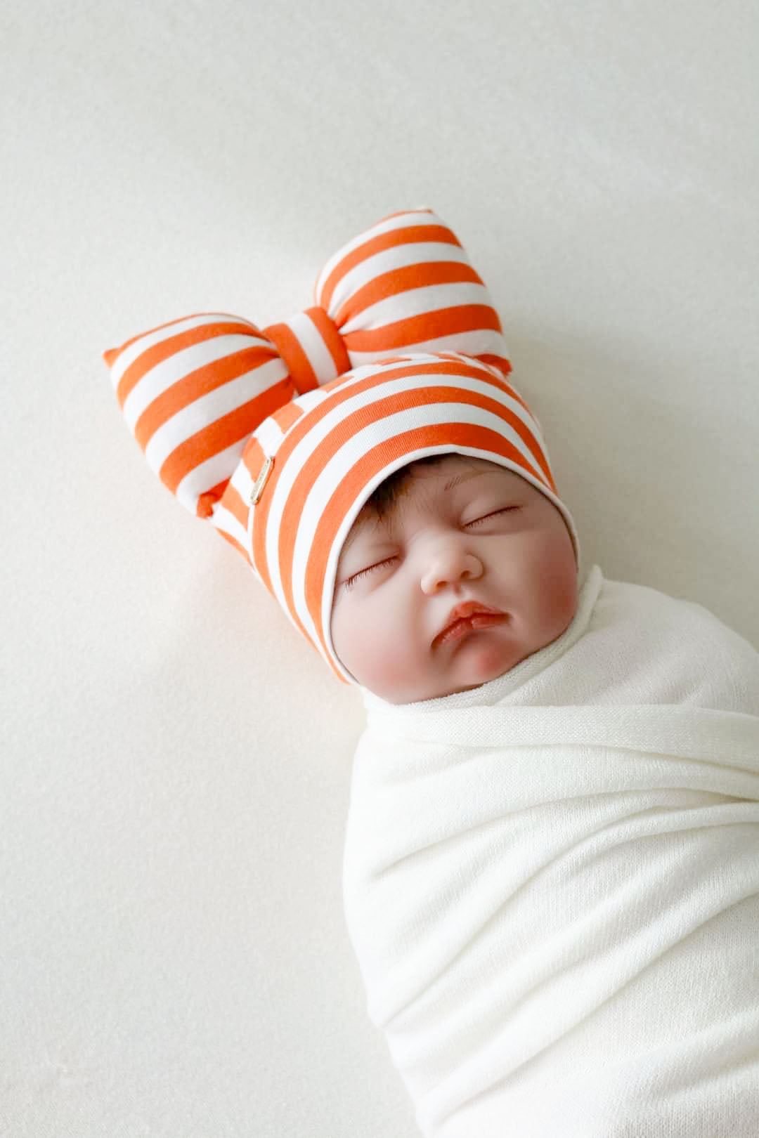 Beanie bow for baby girl or toddler, close up view