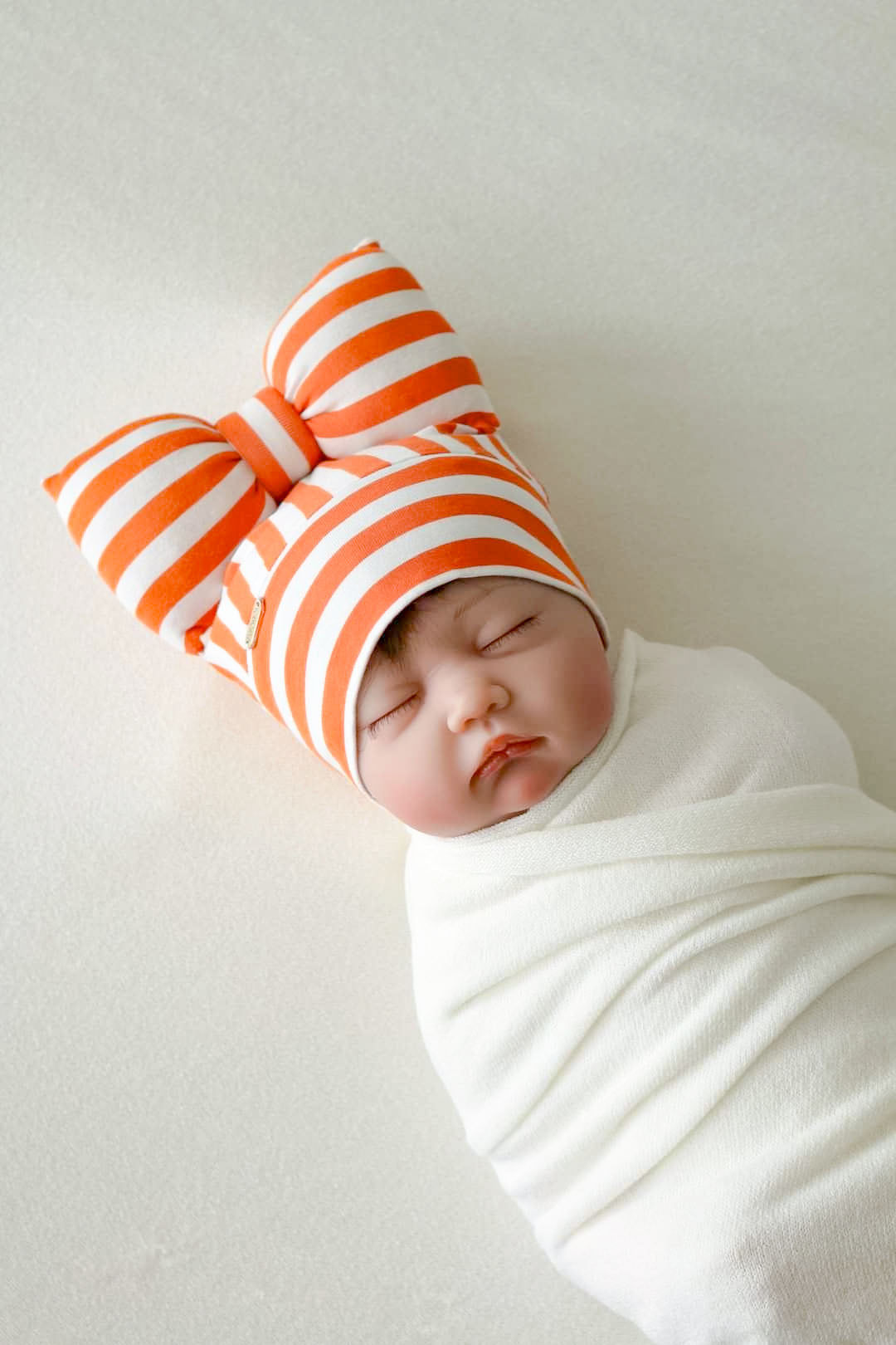 Beanie bow for baby girl or toddler, front view