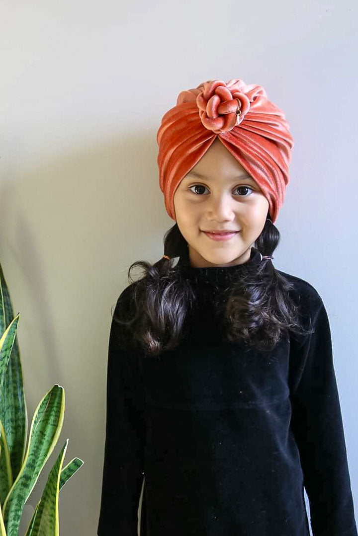 Turban velvet knot in burnt orange close up