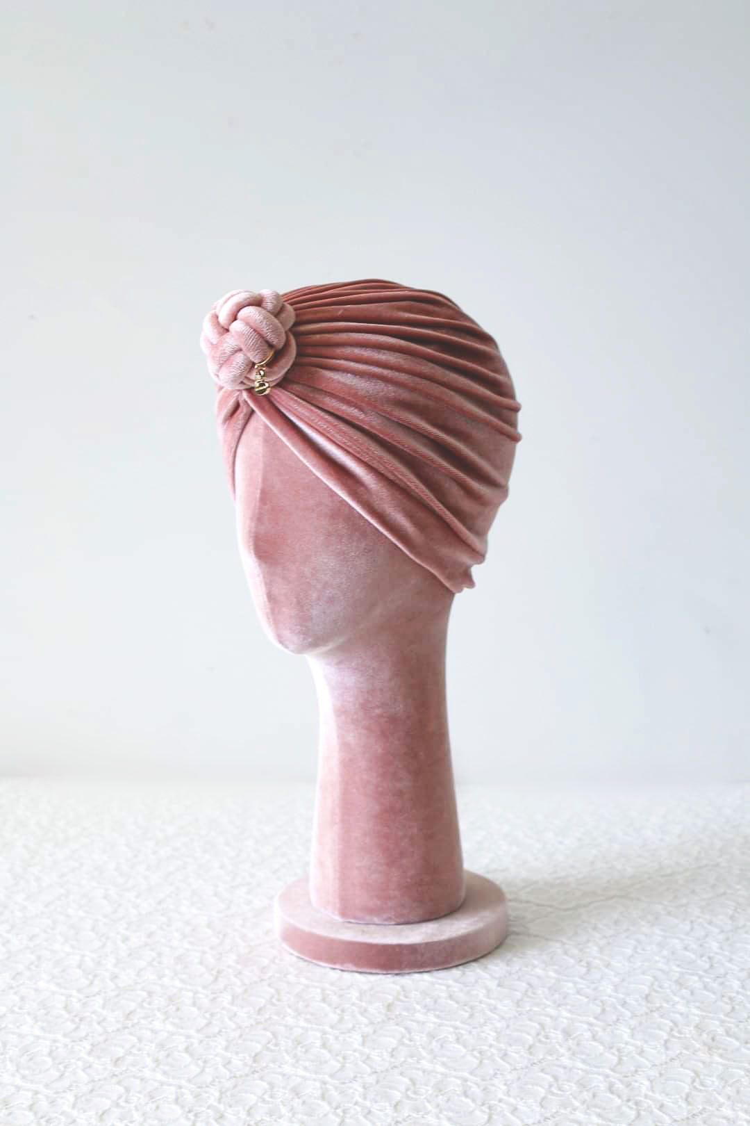 velvet turban knot in details, pink color, turban for women side view