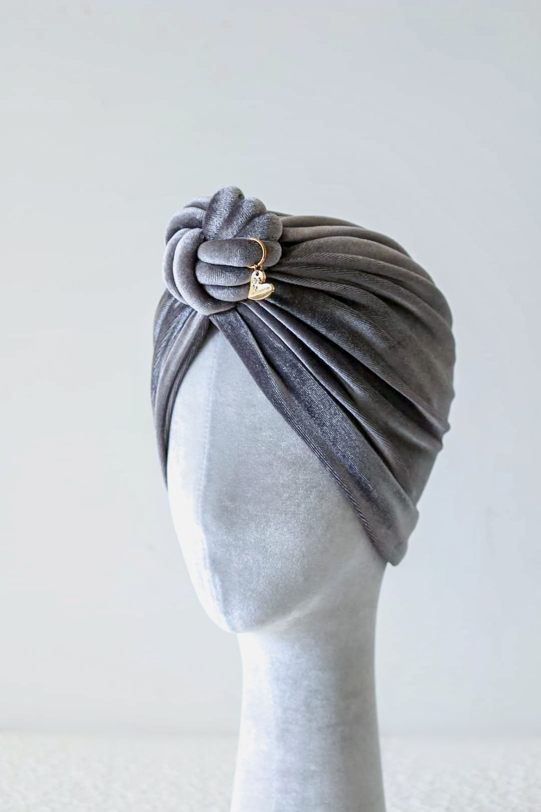 Velvet turban knot in grey color side view