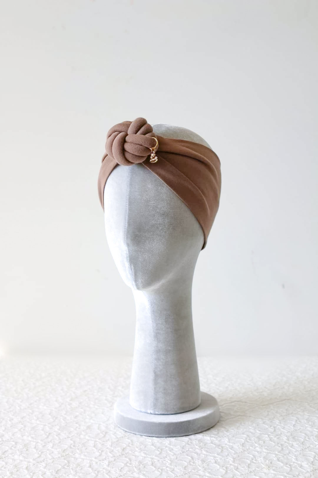 Headband knot in brown color side view