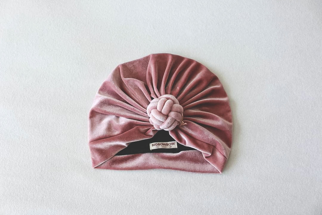 velvet turban knot in details, pink color, turban for women. close up