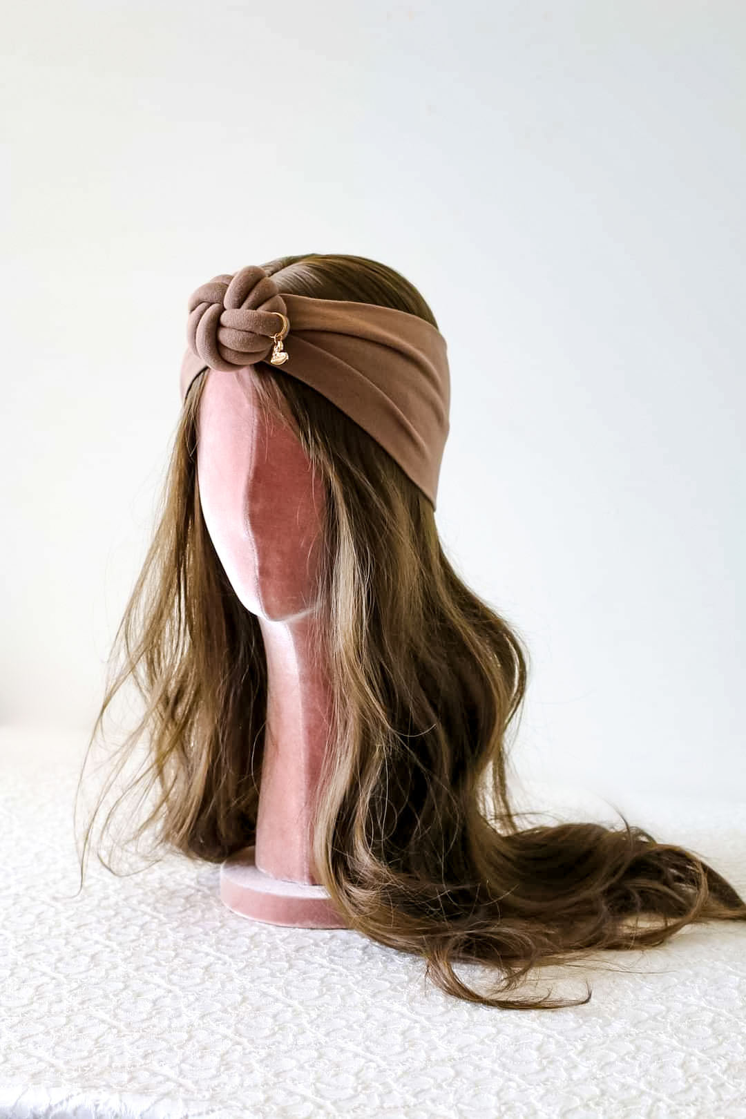 Headband knot in brown color side view 