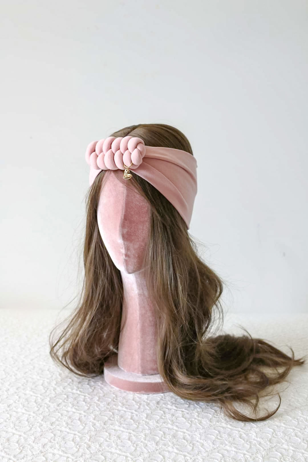 Headband knot in pink powder side view