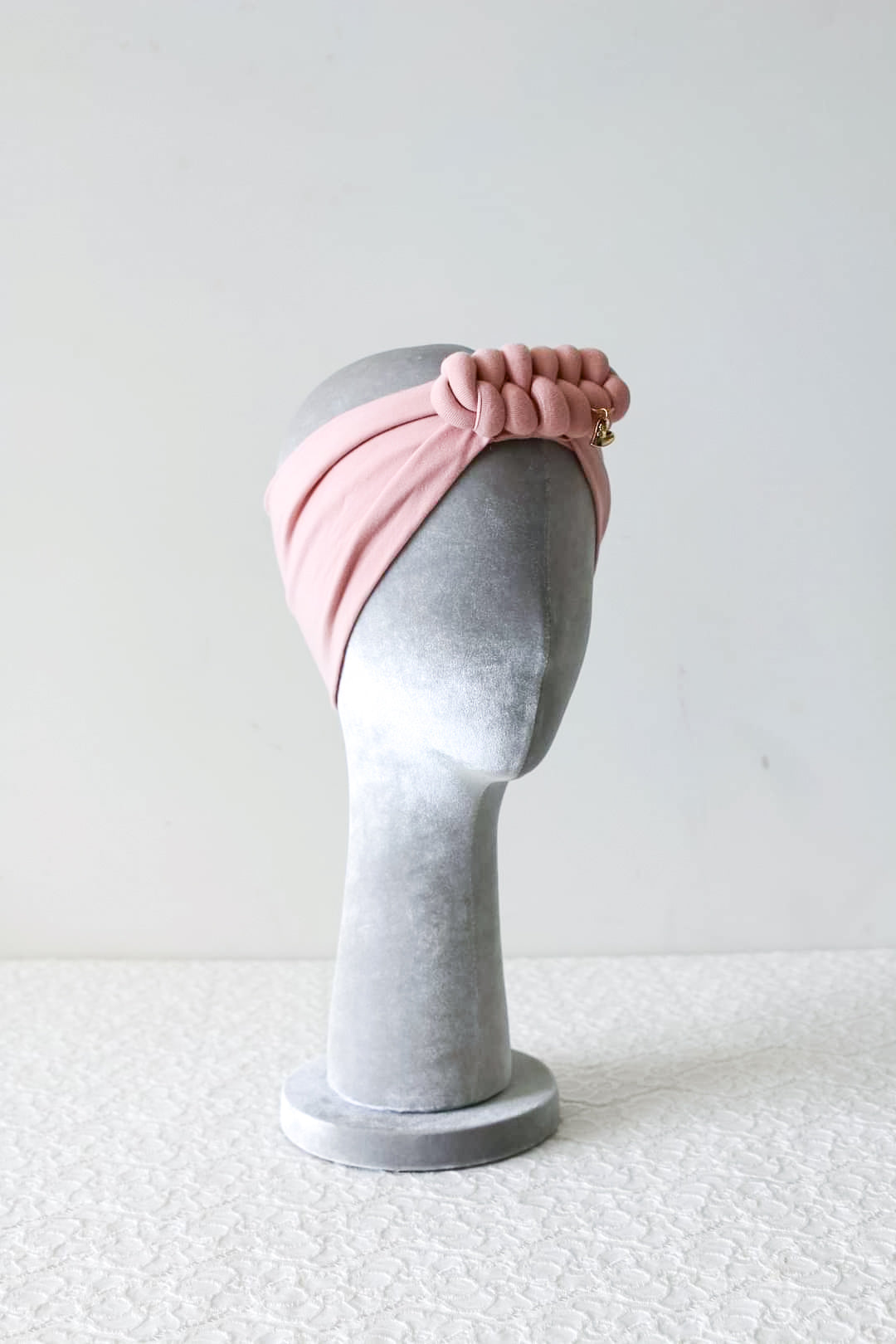 Headband knot in pink powder side view