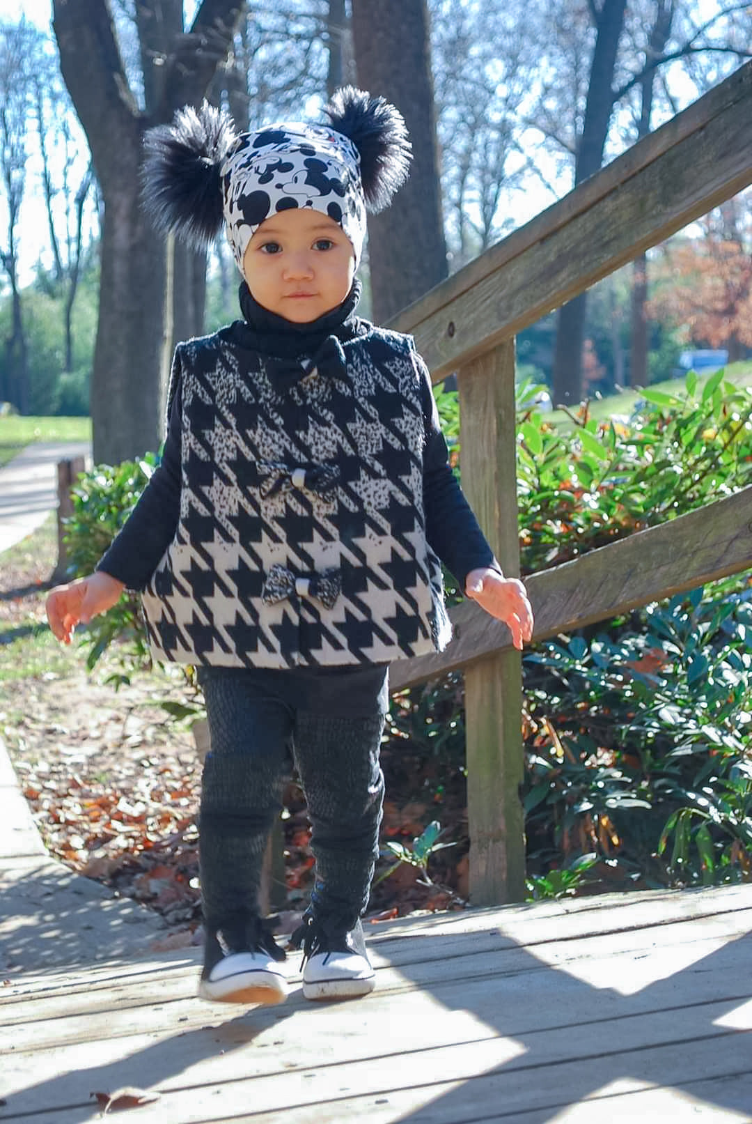 Double pompoms beanie in mickey mouse print front view 