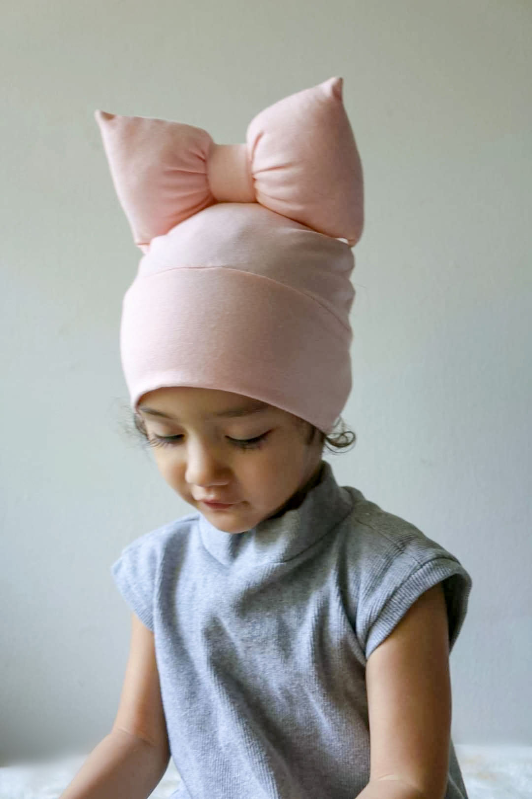 Beanie bow toddler hat soft pink front view